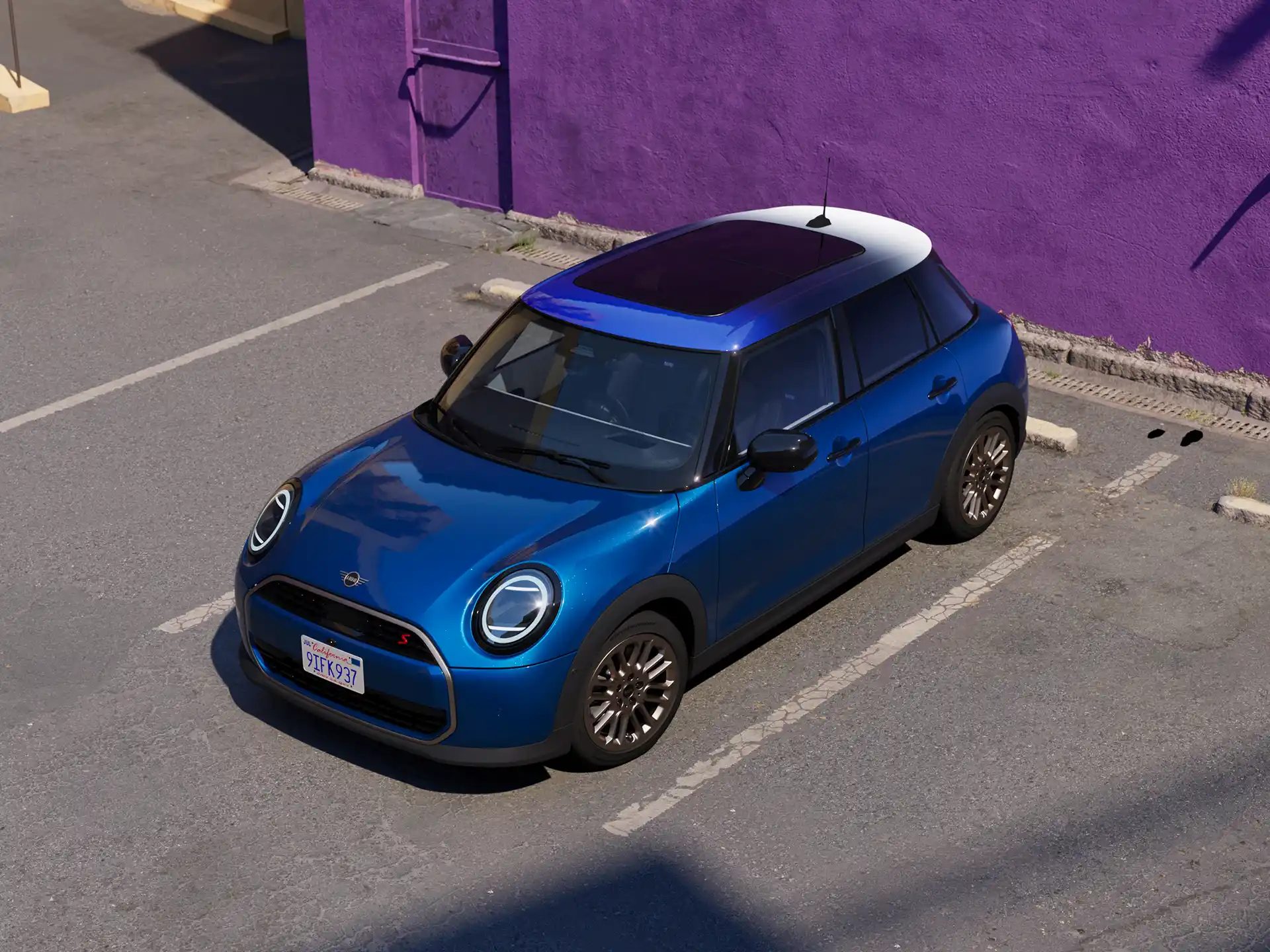 A woman with short blonde hair and colourful clothing smiles as she stands next to the new MINI Cooper 5-Door in Blazing Blue. Side profile of the new MINI Cooper 5-Door in Blazing Blue as it drives past a vibrant orange building in the city.